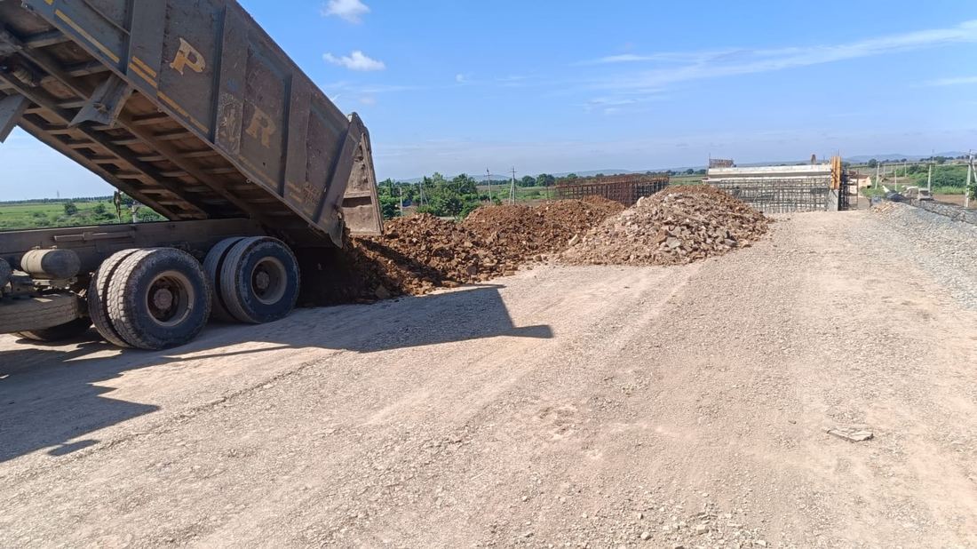 Highway road compaction and grading for MEIL